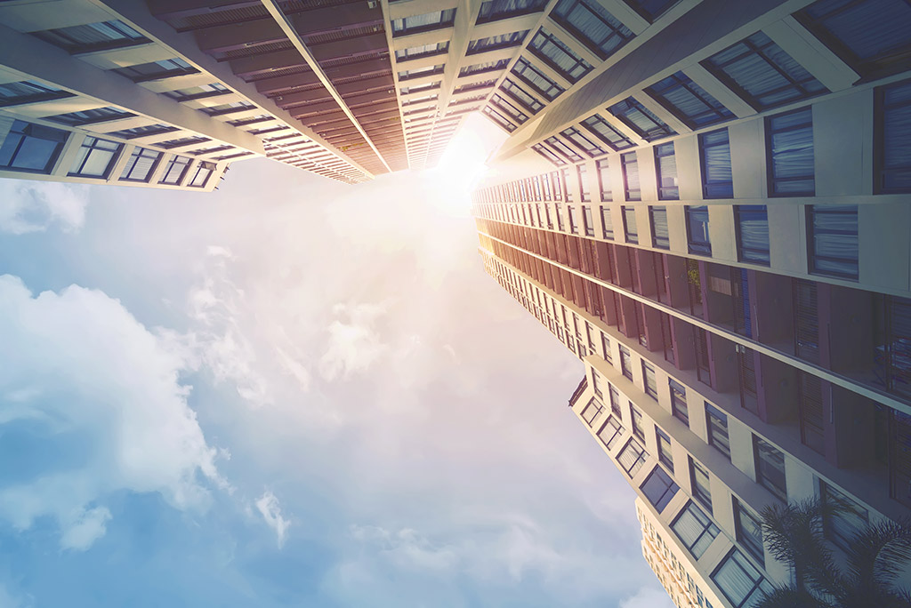 a photo of some building taken from the ground up